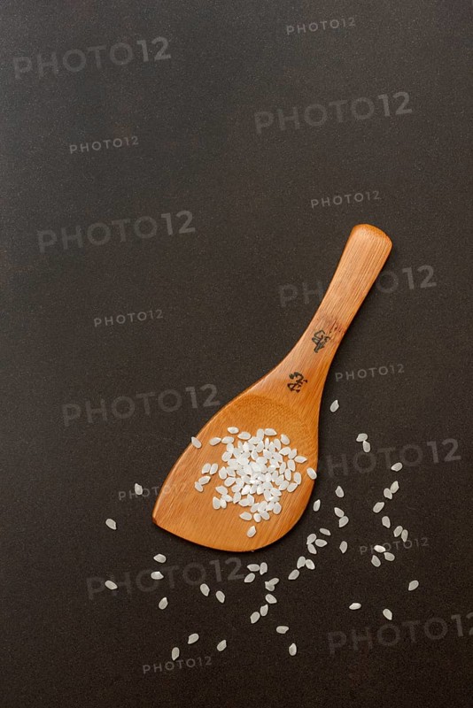 Rice grains with cooking spoon, rice
