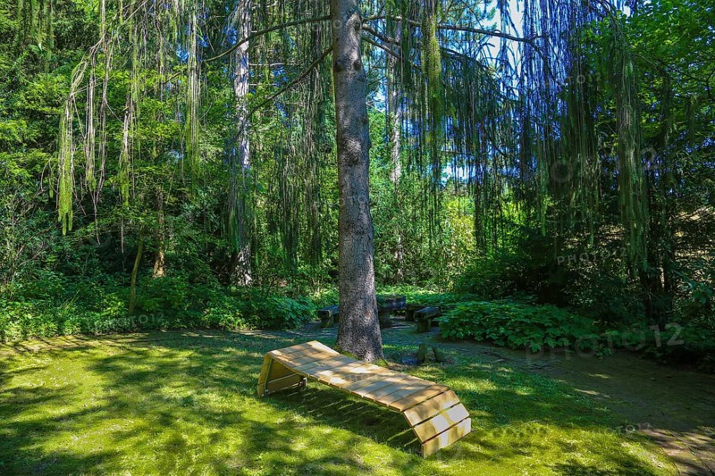 Lounger, idyllic resting place, wooden garden lounger, meadow, trees, green plants, gardens, Baden-Württemberg, Germany