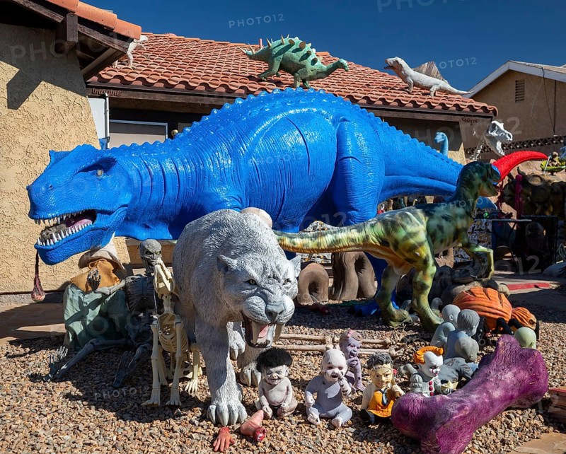 Henderson, Nevada - Dinosaurs dominate the yard of a house in suburban Las Vegas, placed there by retired school teacher Steve Springer