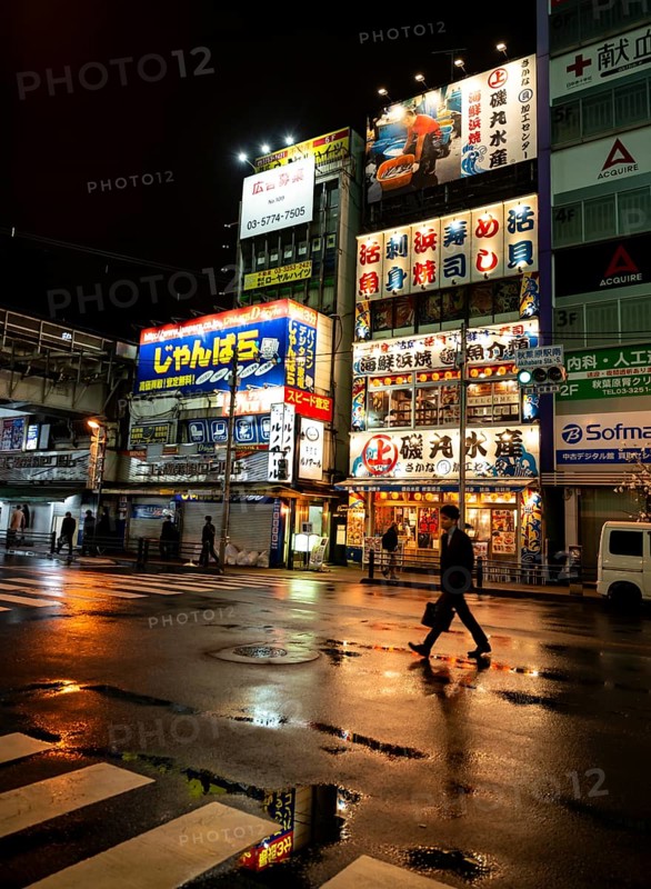 Street with illuminated shops at night in Akihabara, Electric City, Tokyo, Japan