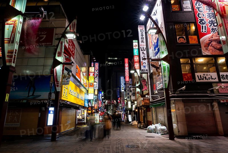 Pedestrian street with neon sign, long exposure, street scene at night, Tokyo, Japan