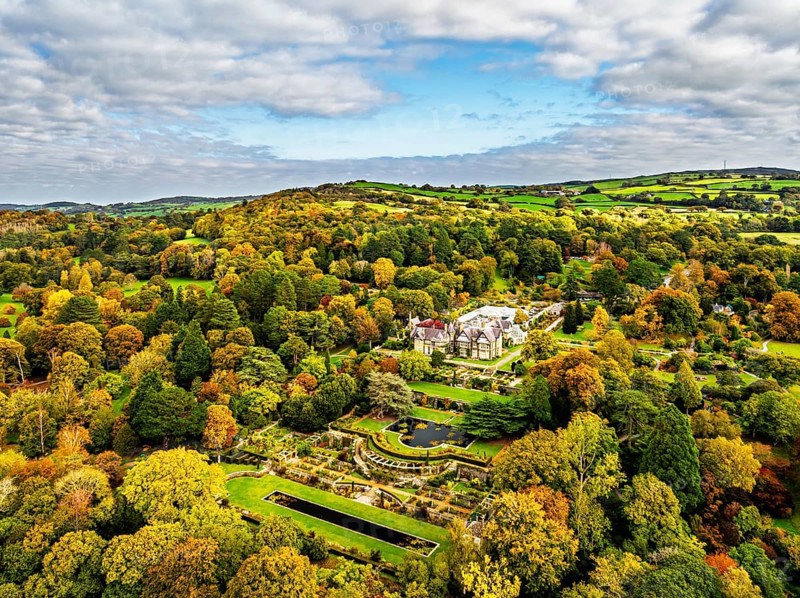 Autumn colours over Bodnant House and Garden from a drone, Conwy River, Colwyn Bay, Conwy, Wales, England, United Kingdom