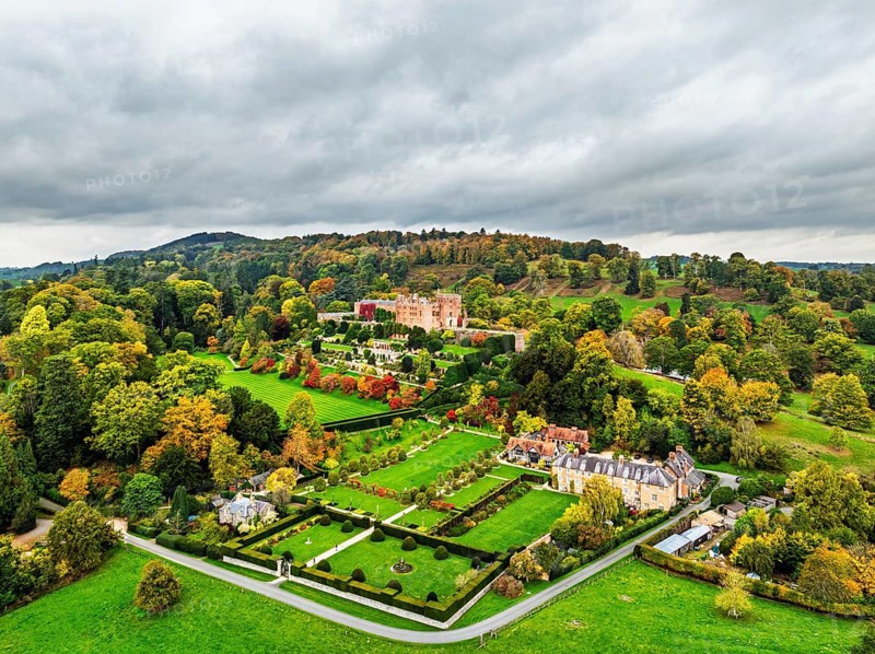 Autumn colours over Powis Castle and Garden from drone, Welshpool, Powys, Wales, England, United Kingdom