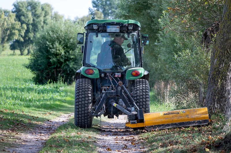 Landscape maintenance with tractor and mower, Darß, Mecklenburg-Vorpommern, Germany