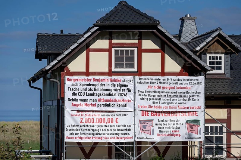 Accusatory posters about donation scandals at a house on the Darß, Meckelnburg-Western Pomerania, Germanymd