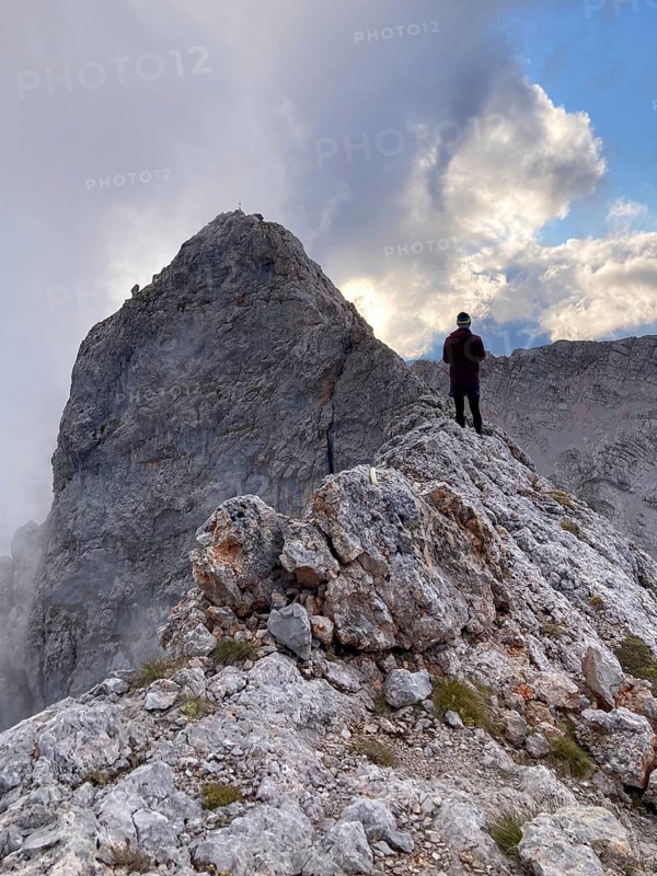 Mountaineers on the ridge of Wildalmkirchl, Steinernes Meer, Berchtesgaden Alps, Austria