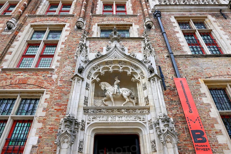 Gruuthusemuseum with equestrian statue of Lodewijk van Gruuthuse above the entrance portal in the historic old town of Bruges, UNESCO World Heritage Site, Flanders, Belgium