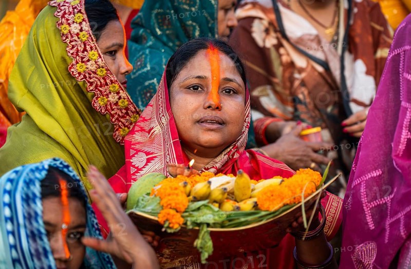 Hindu devotees offer prayers to the Sun God on the bank of Brahmaputra river on the occasion of Chhath Puja, in Guwahati, India on 27 October 2025
