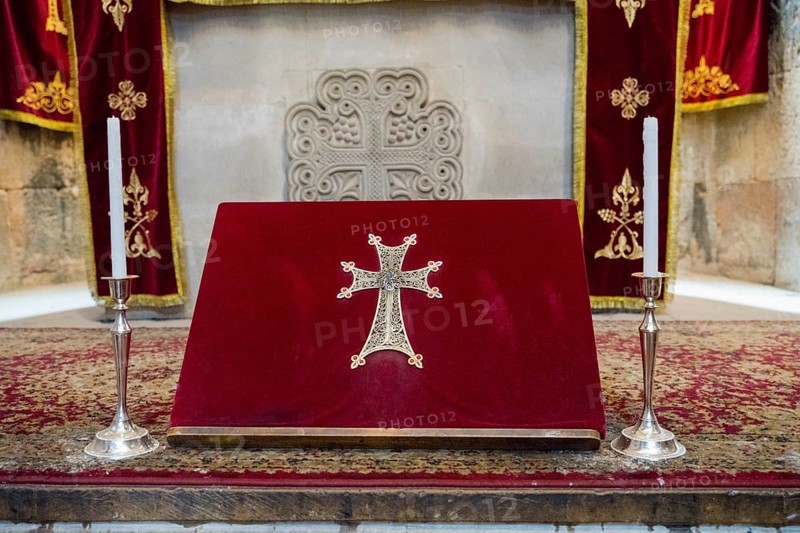 Red altar with golden cross and candle holders, religious site, Noravank monastery, Surb Karapet baptism church, Noravank, Vayots Dzor province, Vayots Dzor, Armenia, Caucasus
