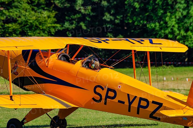 A biplane Bücker Bü 131 Jungmann with registration SP-YPZ during a flight demonstration as part of an air show on Rossfeld in Metzingen-Glems, Baden-Württemberg, Germany, for editorial use only