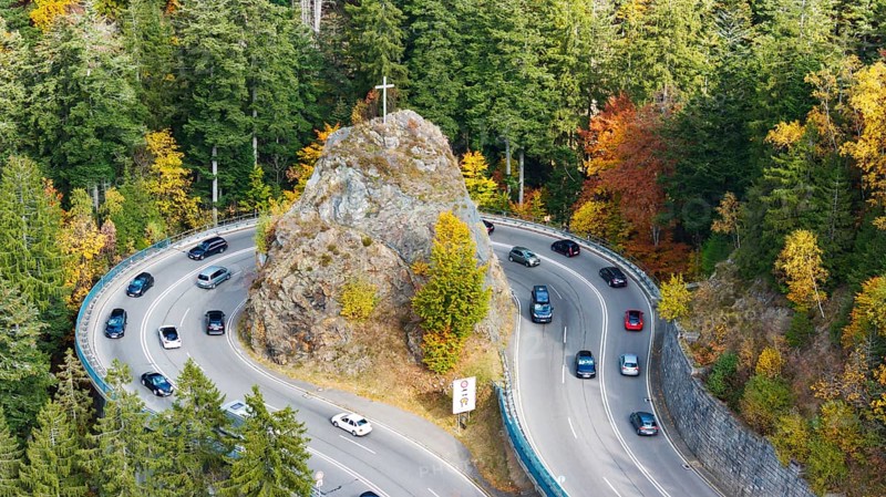 Kreuzfelsenkurve, Bundesstraße 31. The most spectacular curve in the Black Forest in autumn. Drone photo. Breitnau, Baden-Württemberg, Germany