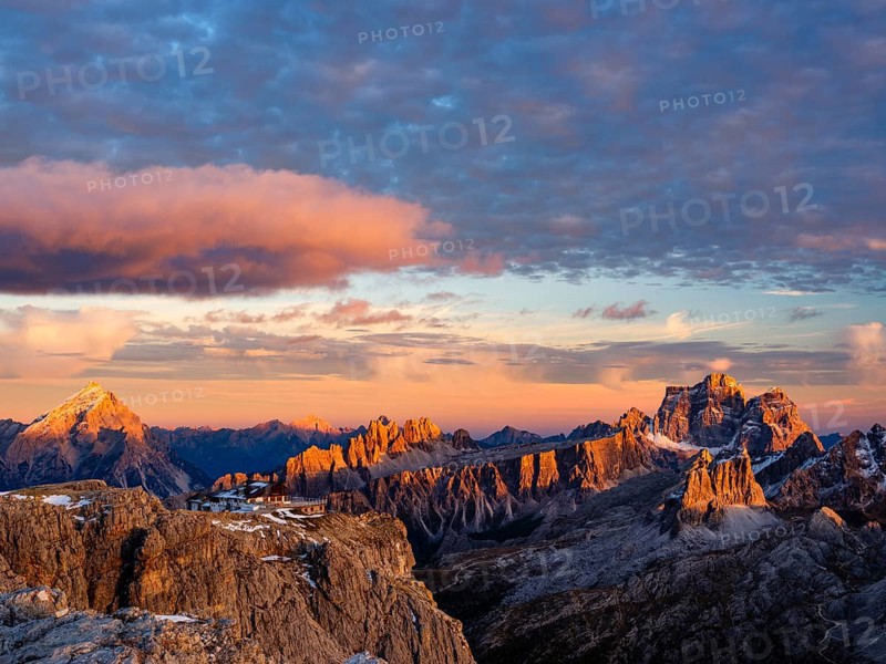 Alpenglühen, Rifugio Lagazuoi and rugged Dolomite peaks at sunset, Dolomites, Alps, Belluno province, Veneto, Italy