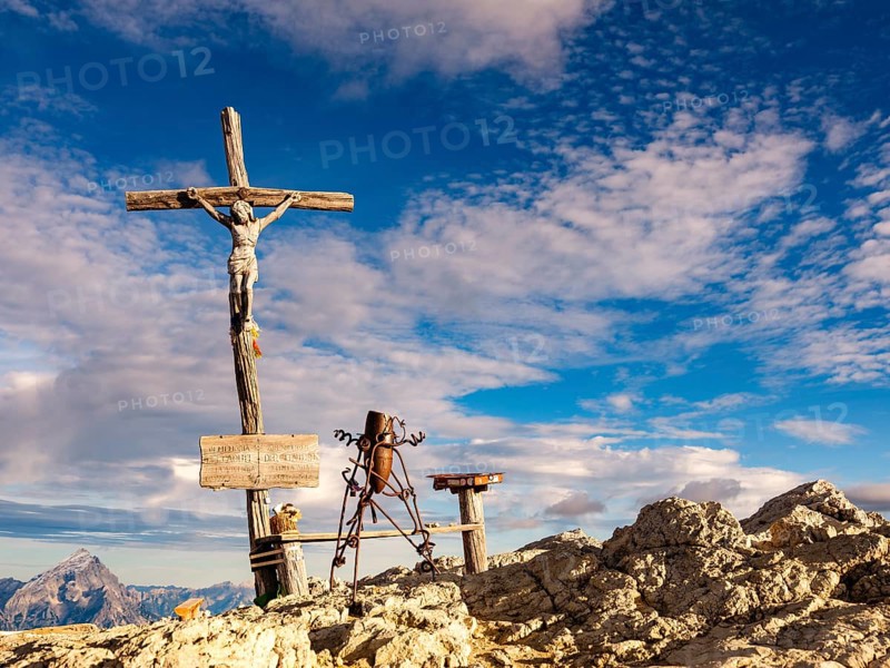 Summit cross and sculpture on the small Lagazuoi, Dolomites, Alps, Belluno province, Veneto region, Italy