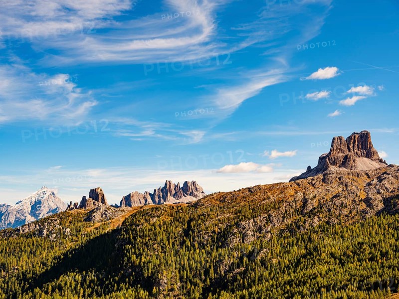 Feather clouds over alpine panorama, in the background Monte Antelao, Cinque Torri, Cima Ambrizzola and Averau, Dolomites, Alps, Belluno province, Veneto, Italy