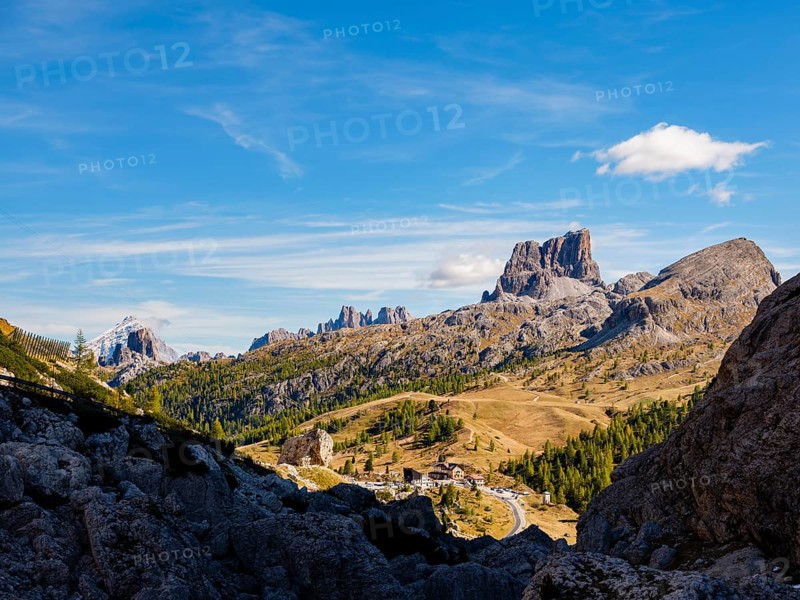 Alpine panorama over the Falzarego Pass, in the background Monte Antelao, Cima Ambrizzola and Averau, Dolomites, Alps, Belluno province, Veneto, Italy