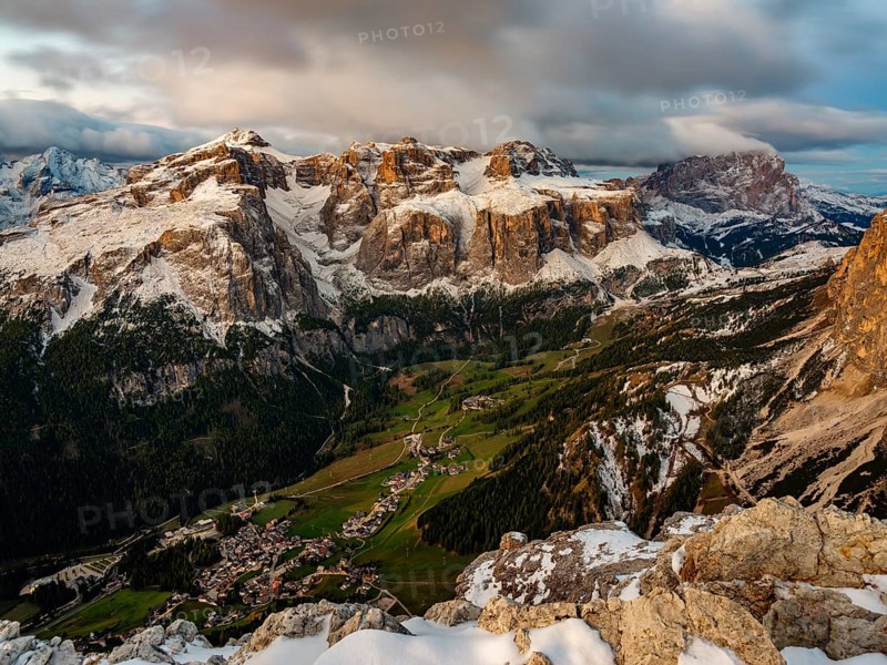 Sella group with fresh snow above the green Val Badia valley, Langkofel on the right, Dolomites, Trentino, South Tyrol, Italy