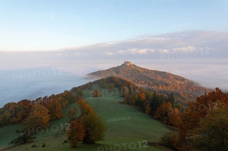 Hohenzollern Castle in a sea of fog at sunrise, autumn in the Swabian Jura