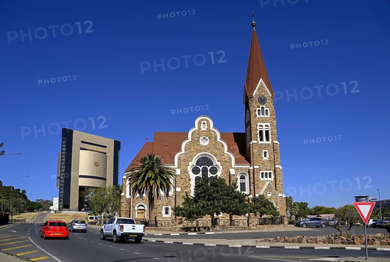 Evangelical Lutheran Christ Church from 1910, in the background the Independence Museum, Windhoek, Khomas region, Namibia