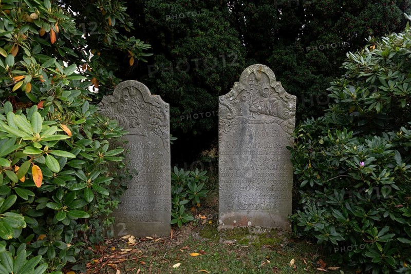 Cemetery of St John's Church with gravestones telling the story of seafarers, known as talking gravestones, Nieblum, Föhr Island, Schleswig-Holstein, Germany