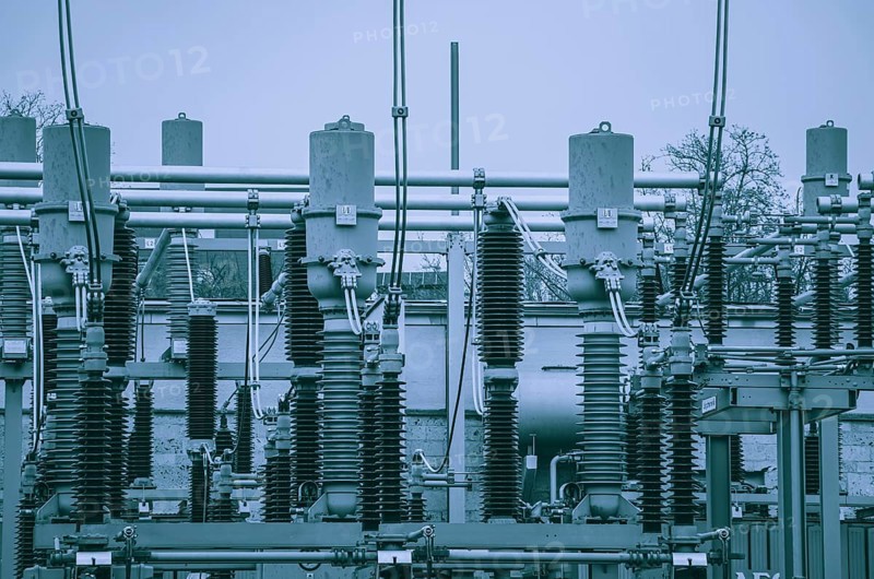 Concept of electricity and power generation using the example of insulators and devices in a substation