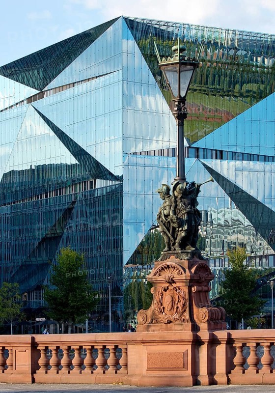 Historic Moltkebrücke with modern Cube Berlin, cube-shaped office building with glass façade reflecting the surroundings, Berlin, Germany