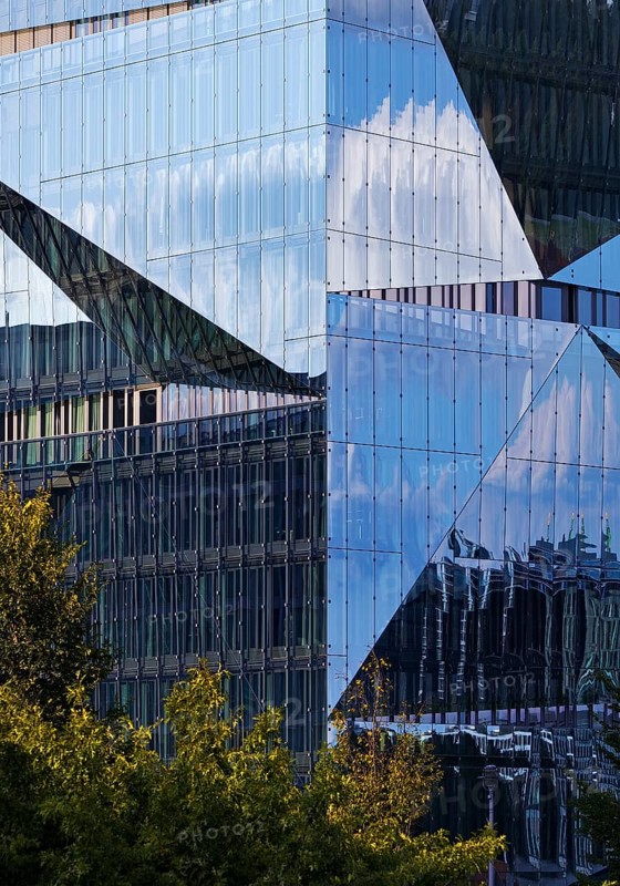 Cube Berlin, cube-shaped office building with folded glass façade reflecting the surroundings, detail, Washingtonplatz, Berlin, Germany