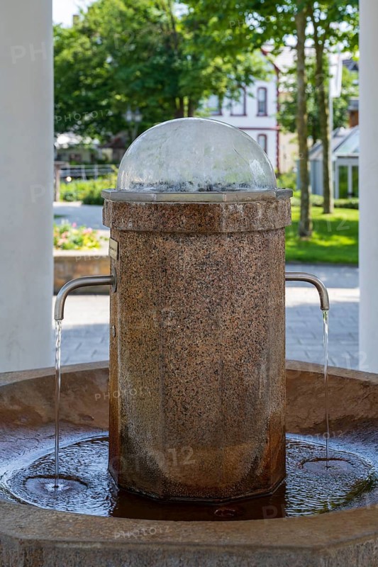Arminius spring, column with running tap, Bad Lippspringe, climatic spa town, Westphalia, North Rhine-Westphalia, Germany