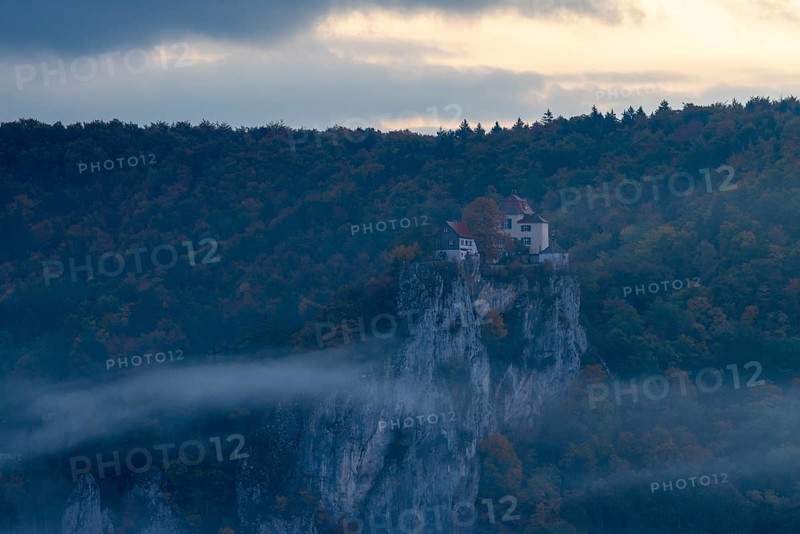 View from the Knopfmacherfelsen to Bronnen Castle, limestone rock, rock face, mixed forest, autumn colours, fog, autumn, Fridingen, Danube Valley, Upper Danube nature park Park, Baden-Württemberg, Germany