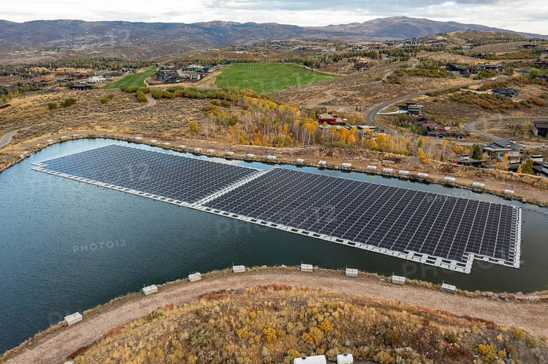 Park City, Utah - Floating solar panels provide power for Mountain Regional Water. The solar array is on the raw water storage pond at the water utility's Signal Hill Treatment Plant
