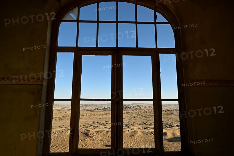 View from a former dwelling house into the desert, Kolmanskop, restricted diamond area, Karas region, Namibia