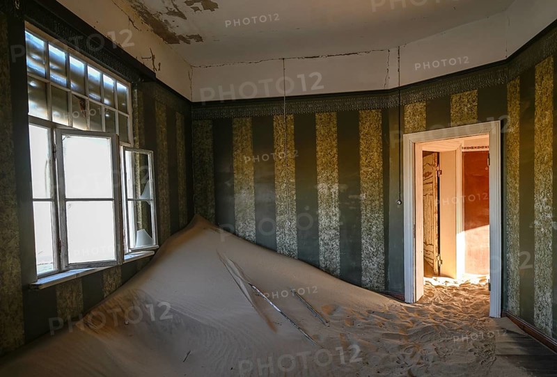 Former dwelling house full of sand, Kolmanskop, restricted diamond area, Karas region, Namibia