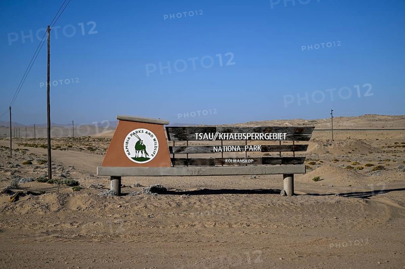 Sign at the entrance to Tsau//Khaeb National Park, near Kolmanskop, diamond restricted area, Karas Region, Namibia