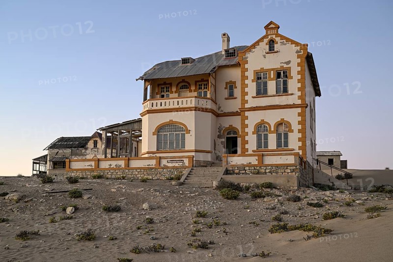 Mine manager's house in the desert sand, Kolmanskop, near Lüderitz, Karas Region, Namibia