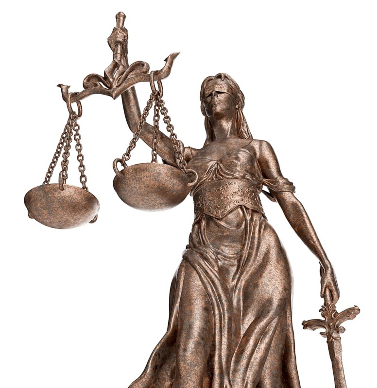 Bronze lady of justice statue isolated on a white background