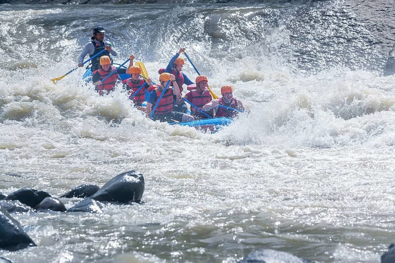 A group of people white water rafting, Costa Rica, Central America