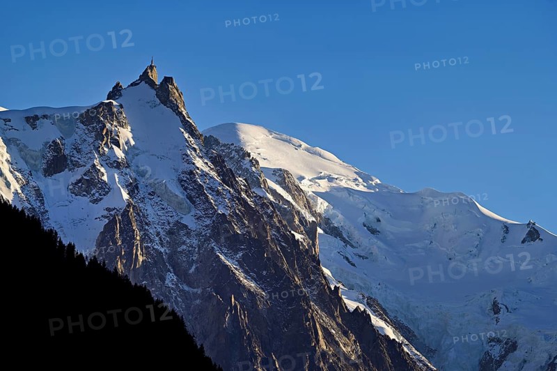 From left snow-covered Aiguille du Midi, Mont-Blanc, Vallot Hut, Chamonix-Mont-Blanc, Haute-Savoie, France