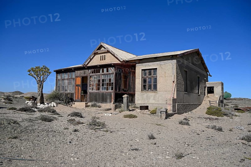 Dilapidated building in the desert sand, Pomona, restricted diamond area, near Lüderitz, Karas region, Namibia