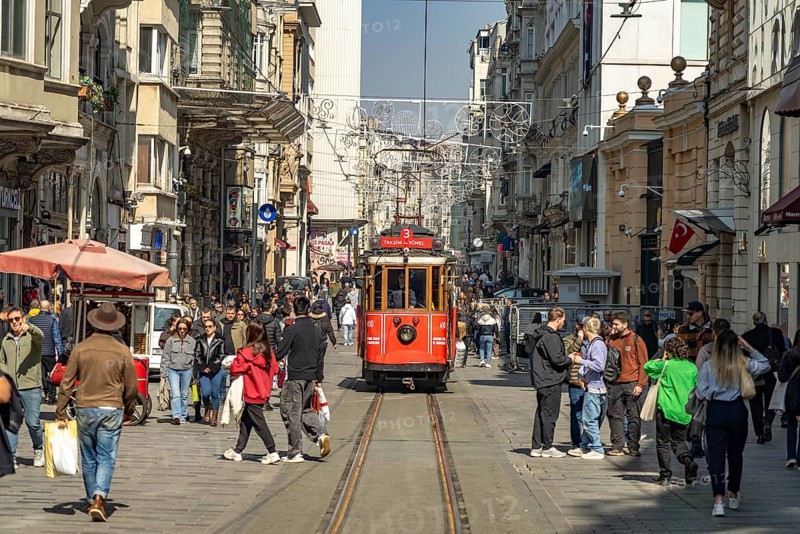The nostalgic tram on the shopping street Istiklal Caddesi in Beyoglu, Istanbul, Turkey