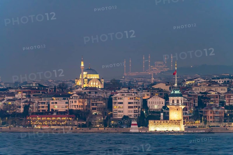 The Maiden Tower lighthouse, Leander Tower or Maiden Tower in front of the Üsküdar district at dusk, Istanbul, Turkey