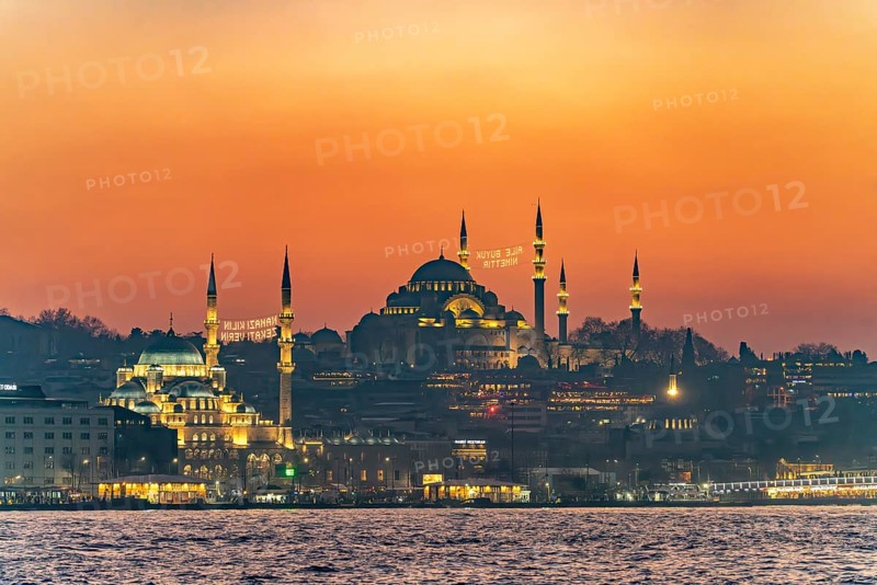The New Mosque Yeni Cami and the Süleymaniye Mosque at dusk, Eminönü, Istanbul, Turkey