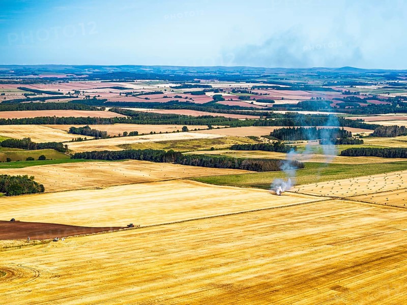 Scottish fields over Waterloo Monument from a drone, Jedburgh, Scotland, UK