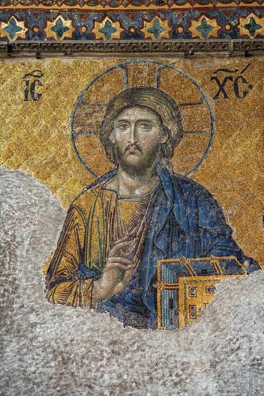 Deësis mosaic with Jesus Christ as Pantocrator in the interior of today's Hagia Sophia mosque or Church of St Sophia, former Byzantine church and museum in Istanbul, Turkey