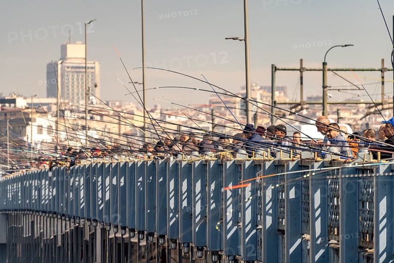 Angler on the Galata Bridge in Istanbul, Turkey