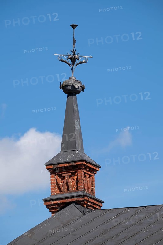 Gable with weather vane and ornamental iron elements, former paper factory and mill for the production of groundwood pulp board, UNESCO World Heritage Site Verla Factory Village, Maailmanperintökohde Verlan puuhiomo ja pahvitehdas, Verla Rapids, Kymenlaakso, near Kouvola, Finland