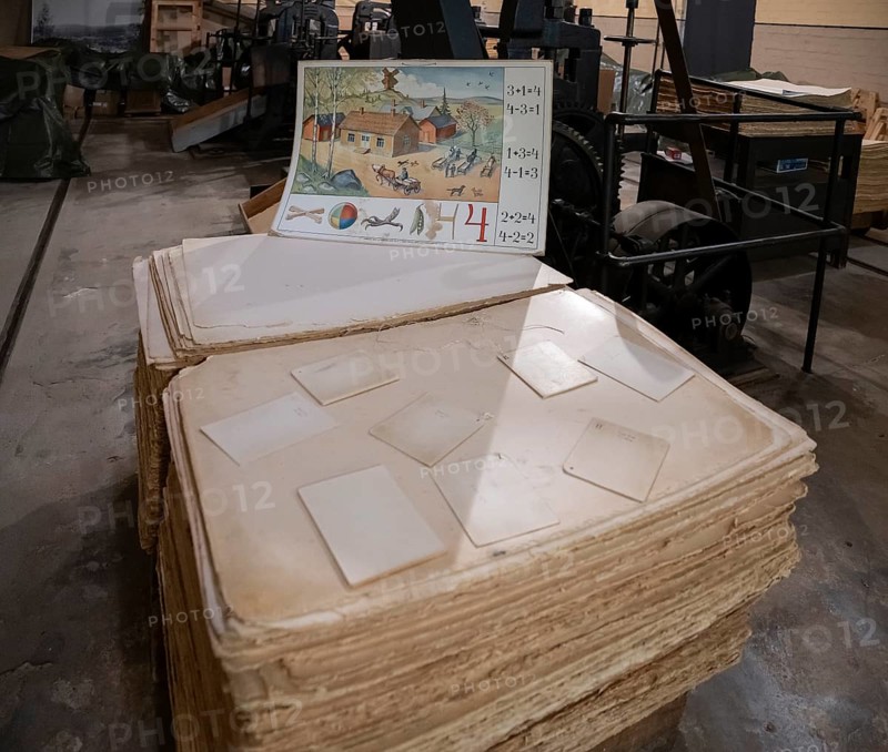 Cardboard stacks and board for school lessons, product of the former paper mill and groundwood pulp board mill, UNESCO World Heritage Site Verla Factory Village, Maailmanperintökohde Verlan puuhiomo ja pahvitehdas, Verla Rapids, Kymenlaakso, near Kouvola, Finland