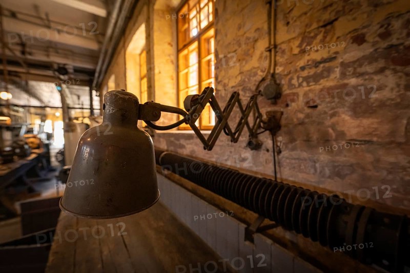 Old industrial lamp, former paper mill and groundwood pulp board mill, UNESCO World Heritage Site Verla Factory Village, Maailmanperintökohde Verlan puuhiomo ja pahvitehdas, Verla Rapids, Kymenlaakso, near Kouvola, Finland