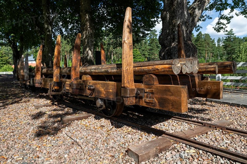 Railway tracks and wagons on rails for timber transport, former paper factory and mill for the production of groundwood pulp board, UNESCO World Heritage Site Verla Factory Village, Maailmanperintökohde Verlan puuhiomo ja pahvitehdas, Verla Rapids, Kymenlaakso, near Kouvola, Finland
