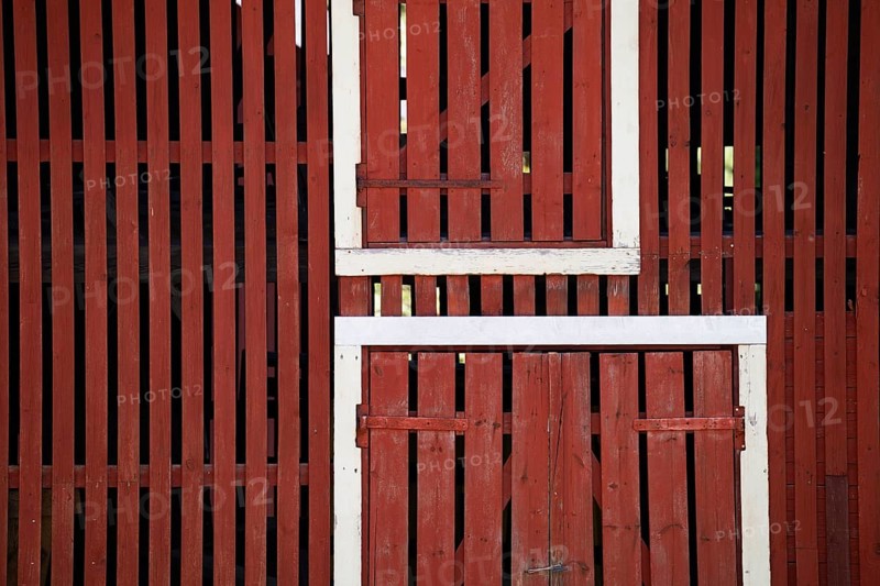 Falun red painted wooden slats of a barn, former paper factory and mill for the production of groundwood pulp board, UNESCO World Heritage Site Factory Village Verla, Maailmanperintökohde Verlan puuhiomo ja pahvitehdas, Verla Rapids, Kymenlaakso, near Kouvola, Finland