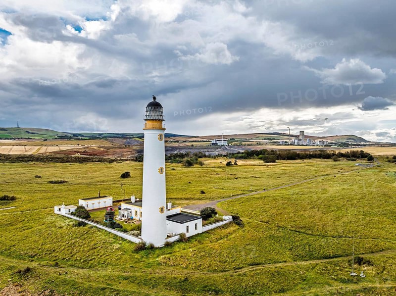 Rain Clouds over Barns Ness Lighthouse from a drone, Dunbar, East Lothian, Scotland, UK