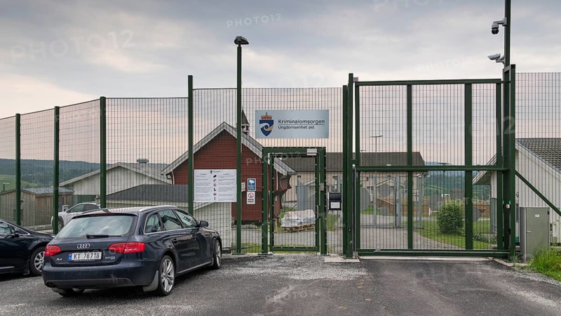 Locked entrance with fence and Tor tor to a prison, near Eidsvoll, Norway